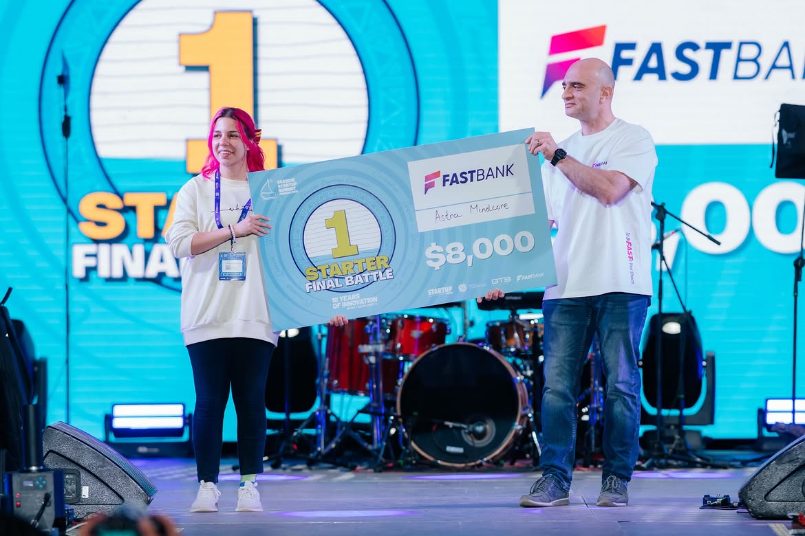 Hanna Harutyunyan accepting the 1st place Starter Track award for ASTRA MINDCORE at Seaside Startup Summit 2026, presented by FastBank